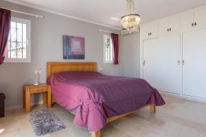 Łóżko lub łóżka w pokoju w obiekcie Super Villa priv heated pool 3bed