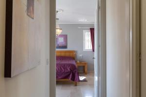 Łóżko lub łóżka w pokoju w obiekcie Super Villa priv heated pool 3bed