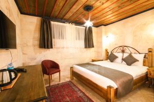 מיטה או מיטות בחדר ב-Sapphire Stone hotel