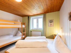 Postel nebo postele na pokoji v ubytování Apartment in Sankt Gallenkirch near Ski Lift