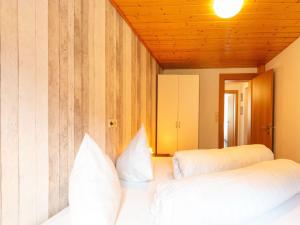Postel nebo postele na pokoji v ubytování Apartment in Sankt Gallenkirch near Ski Lift