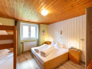 Postel nebo postele na pokoji v ubytování Apartment in Sankt Gallenkirch near Ski Lift