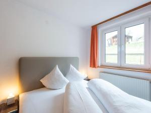 Postel nebo postele na pokoji v ubytování Apartment in Sankt Gallenkirch near Ski Lift