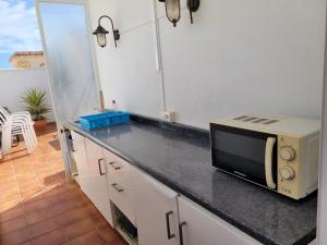 Kuchnia lub aneks kuchenny w obiekcie Penthouse Clavero Casasol