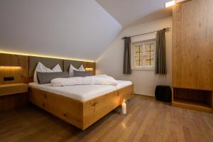 Posteľ alebo postele v izbe v ubytovaní eichberg living + 37 fotografií