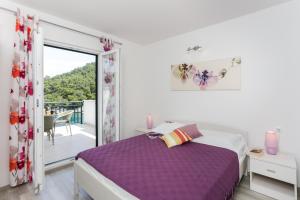 Postel nebo postele na pokoji v ubytování Apartments Posta