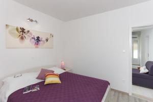 Postel nebo postele na pokoji v ubytování Apartments Posta