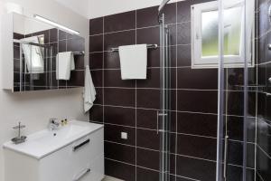 Koupelna v ubytování Apartments Posta