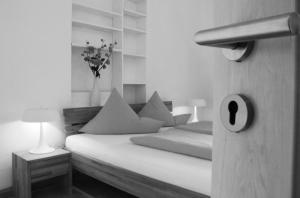 Postel nebo postele na pokoji v ubytování Pension Stoi budget guesthouse