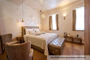 Hiša Ančka, Boutique Hotel & Maja Rooms客房内的一张或多张床位