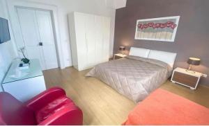 A bed or beds in a room at Porto Gaio Accomodation