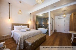 Hiša Ančka, Boutique Hotel & Maja Rooms客房内的一张或多张床位