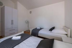 Postel nebo postele na pokoji v ubytování Villa Ellen Sophie