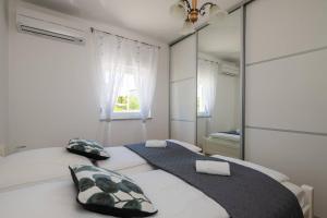 Postel nebo postele na pokoji v ubytování Villa Ellen Sophie