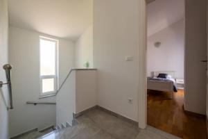 Postel nebo postele na pokoji v ubytování Villa Ellen Sophie