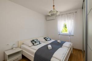 Postel nebo postele na pokoji v ubytování Villa Ellen Sophie