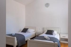 Postel nebo postele na pokoji v ubytování Villa Ellen Sophie