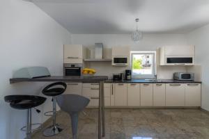 Kuchyň nebo kuchyňský kout v ubytování Villa Ellen Sophie