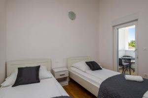 Postel nebo postele na pokoji v ubytování Villa Ellen Sophie