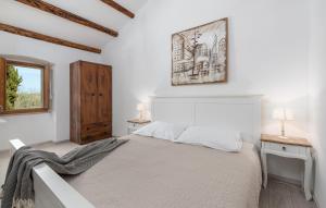 Ένα ή περισσότερα κρεβάτια σε δωμάτιο στο Villa Anima