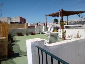 Balkón nebo terasa v ubytování Pensión España