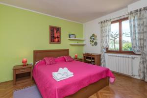 Postel nebo postele na pokoji v ubytování Apartment Mirijana