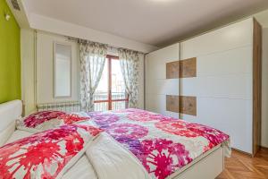 Posteľ alebo postele v izbe v ubytovaní Apartment Mirijana