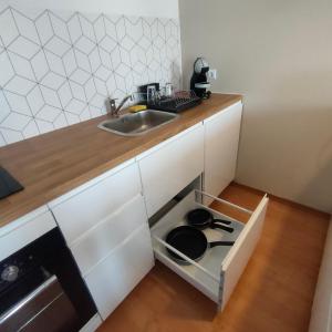 Kuchnia lub aneks kuchenny w obiekcie Apartament Dziwnów