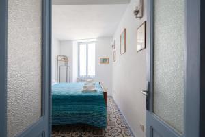 A bed or beds in a room at Casa GiGio 011030-LT-0223