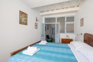 A bed or beds in a room at Casa GiGio 011030-LT-0223