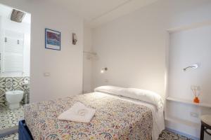 A bed or beds in a room at Casa GiGio 011030-LT-0223