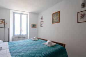 A bed or beds in a room at Casa GiGio 011030-LT-0223