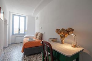 A seating area at Casa GiGio 011030-LT-0223