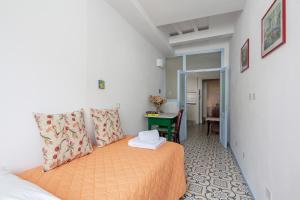 A bed or beds in a room at Casa GiGio 011030-LT-0223