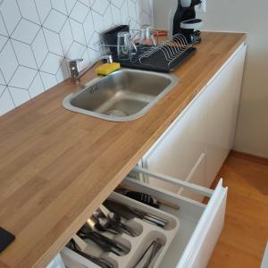 Kuchnia lub aneks kuchenny w obiekcie Apartament Dziwnów