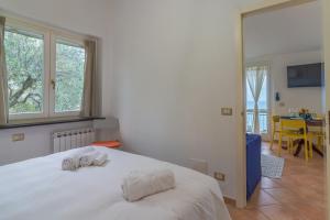 Postel nebo postele na pokoji v ubytování CASA CAMILLA Relax con una vista da sogno