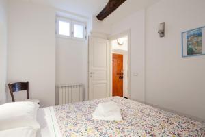 A bed or beds in a room at Casa GiGio 011030-LT-0223