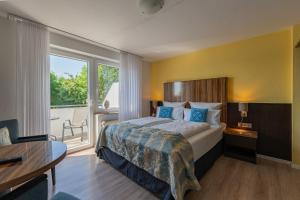 Postel nebo postele na pokoji v ubytování Hotel Nordstern
