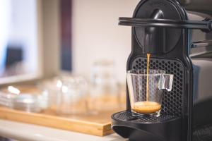 Coffee and tea making facilities at 3 Rooms 3 Bathrooms - Lovely Apartment close the Vatican