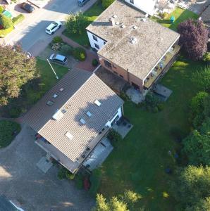 an overhead view of a house with a roof at Pension Haus Baltic in Dahme
