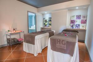 Postel nebo postele na pokoji v ubytování HG Tenerife Sur