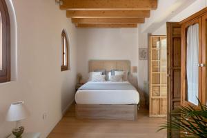 Katil atau katil-katil dalam bilik di Hommyhome Sevilla Natural Passivhaus