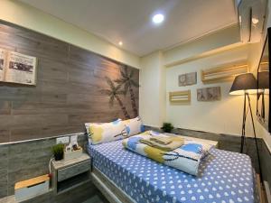 Una cama o camas en una habitación de Hong Kong Hostel (Tsim Sha Tsui Mansion)