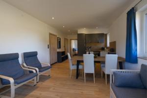 Telewizja i/lub zestaw kina domowego w obiekcie Appartements Wolf