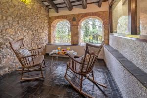 Posezení v ubytování Masia Marco Lux, ideal familias con gran zona exterior y Piscina