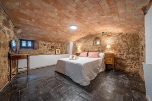Postel nebo postele na pokoji v ubytování Masia Marco Lux, ideal familias con gran zona exterior y Piscina