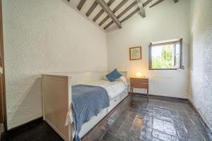 Postel nebo postele na pokoji v ubytování Masia Marco Lux, ideal familias con gran zona exterior y Piscina