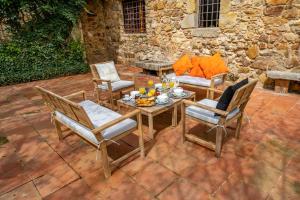 Posezení v ubytování Masia Marco Lux, ideal familias con gran zona exterior y Piscina