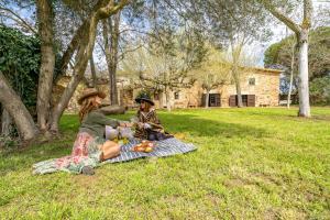 Zahrada ubytování Masia Marco Lux, ideal familias con gran zona exterior y Piscina
