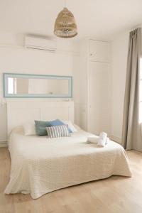 Llit o llits en una habitació de Villa Sa Caleta